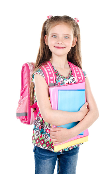 Portrait of smiling schoolgirl with books and backpack - Photo, image
