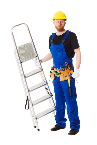 Man builder in the jumpsuit, isolated - Photo, Image