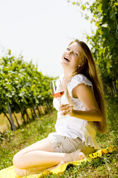 Woman at a picnic in vineyard - Photo, Image