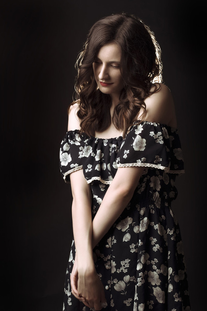 Pretty smiling woman posing in a vintage dress - Photo, Image