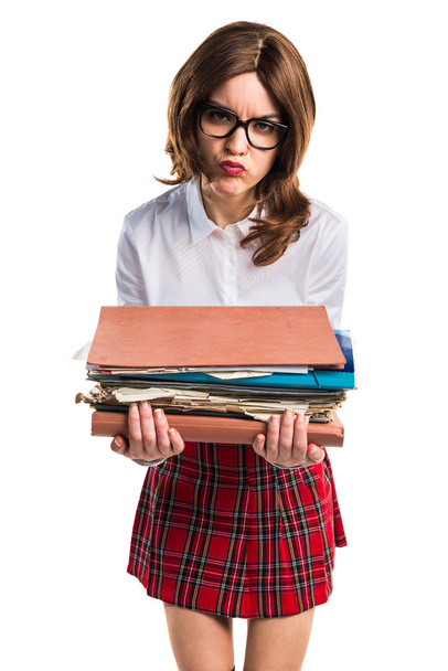 Студентська дівчина тримає кілька нотаток коледжу
 - Фото, зображення