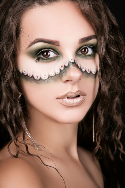 portrait of a beautiful young girl with professional makeup - Photo, Image