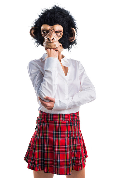 Girl with monkey mask thinking - Photo, Image