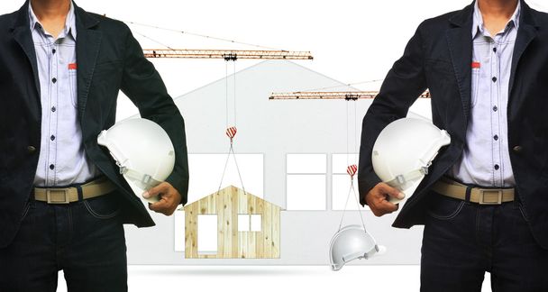 αρχιτέκτονας και κατασκευή γερανό ανύψωσης σπίτι και ασφάλειας κράνος  - Φωτογραφία, εικόνα