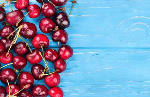 Red cherries in table - Photo, Image