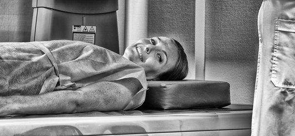 Woman undergoing mri in hospital. Healthcare concept - 写真・画像