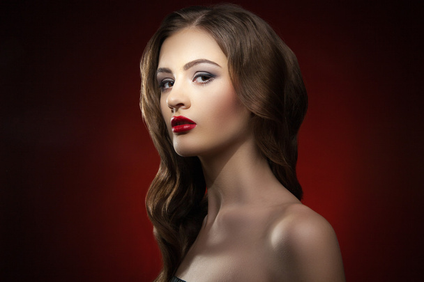 Beautiful model with make-up looking at camera - Photo, Image
