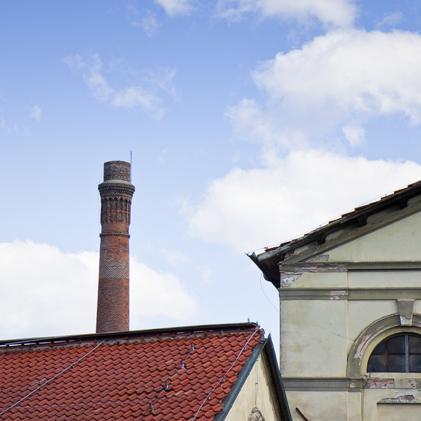 Old brick chimney near an old factory (Tuscany - Italy) - Photo, Image