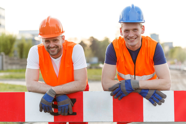 Happy smiling construction workers - Zdjęcie, obraz
