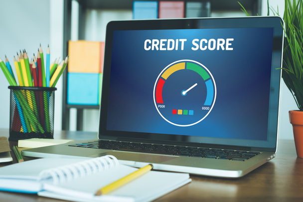 Computer with credit score application  - Foto, afbeelding