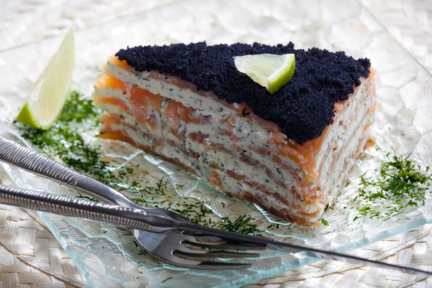 Cake of smoked salmon with caviar - Photo, Image
