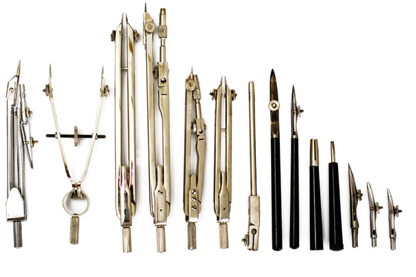 Par de brújulas y otros instrumentos de dibujo
 - Foto, imagen