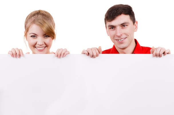 Couple with blank presentation board banner sign - Фото, зображення