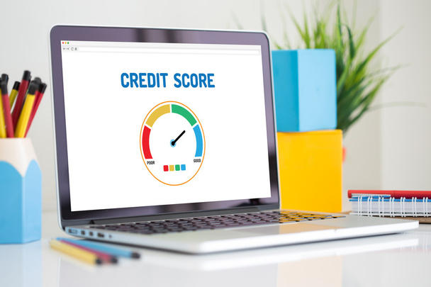 Computer with credit score application  - Фото, изображение