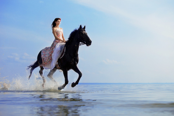 Woman on a horse by the sea - Fotografie, Obrázek