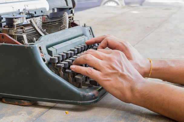 Typewriter and human hand - Photo, Image