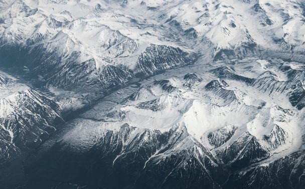 Snow-capped mountains. - Фото, зображення
