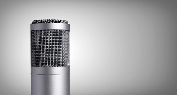 Vintage microphone on gray background - Φωτογραφία, εικόνα