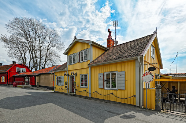 Colorful houses in the historic center of Sigtuna, Sweden - Fotó, kép