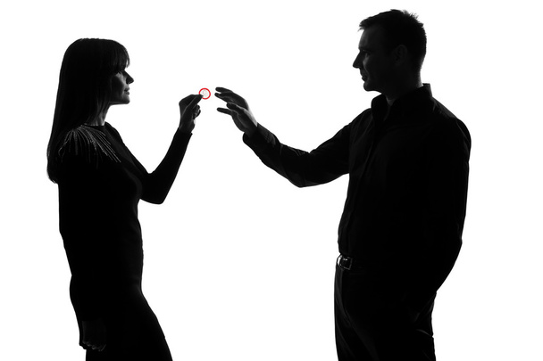 One couple man and woman holding giving condom - Foto, immagini