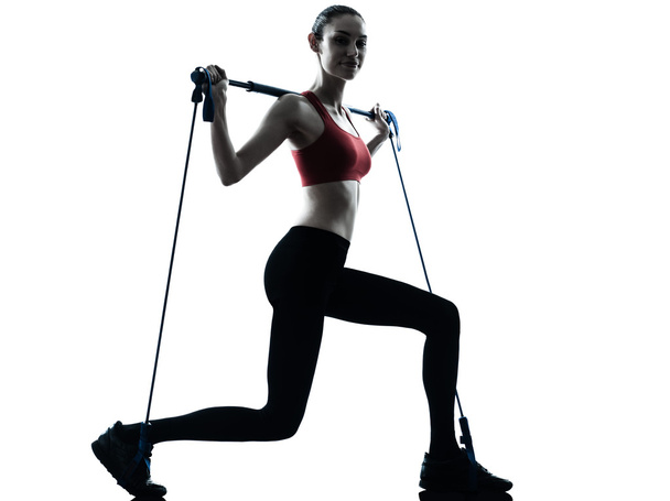 Woman exercising gymstick - Valokuva, kuva