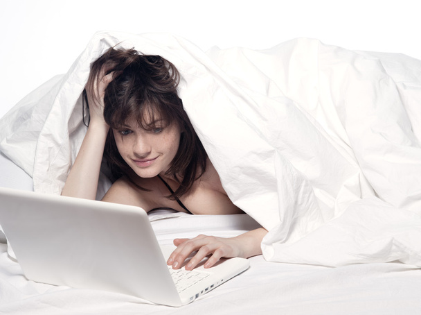 Woman in bed awakening - Zdjęcie, obraz