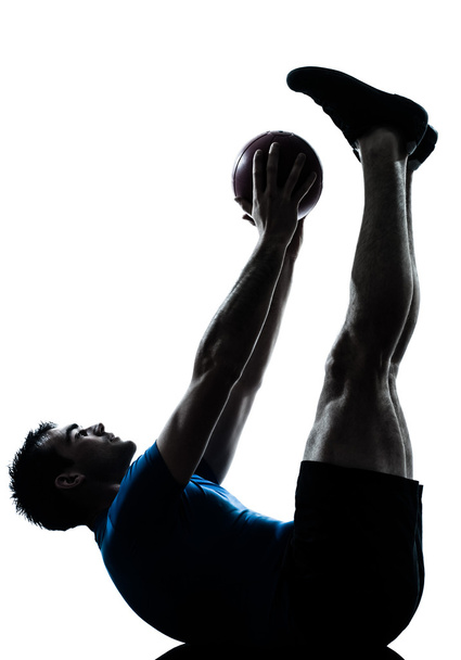 Man exercising workout holding fitness ball posture - Foto, immagini