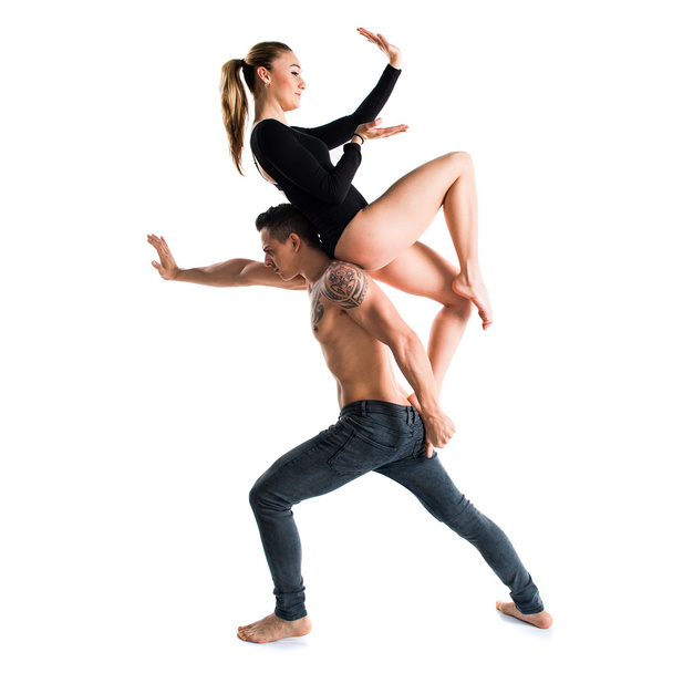 Двоє людей танцюють над ізольованим тлом
 - Фото, зображення