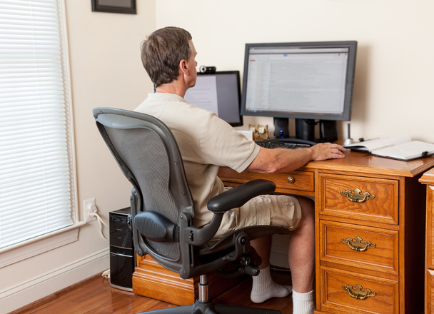 Senior male working in home office - Photo, Image