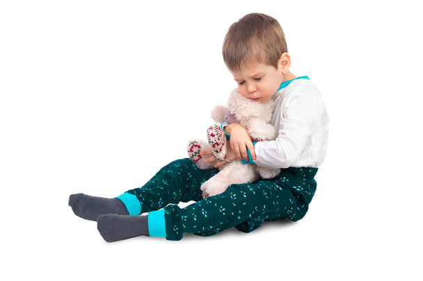 Little boy with a plush toy - Zdjęcie, obraz