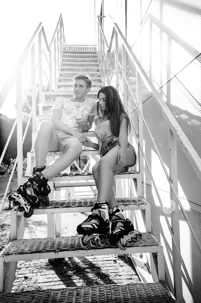 couple in love sitting on the stairs - Φωτογραφία, εικόνα