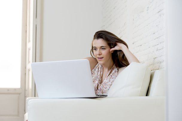 young beautiful woman working with laptop computer smiling happy or doing online internet shopping - Foto, Bild