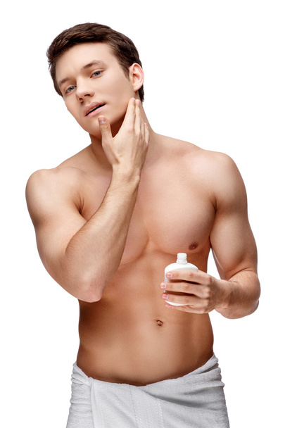 Handsome young man sniffing his armpit - Foto, Imagem