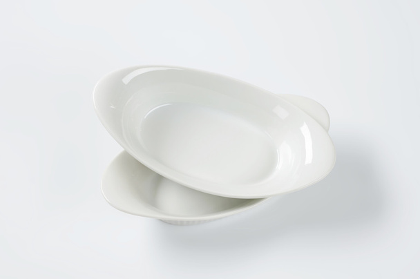 two oval baking dishes - Фото, изображение