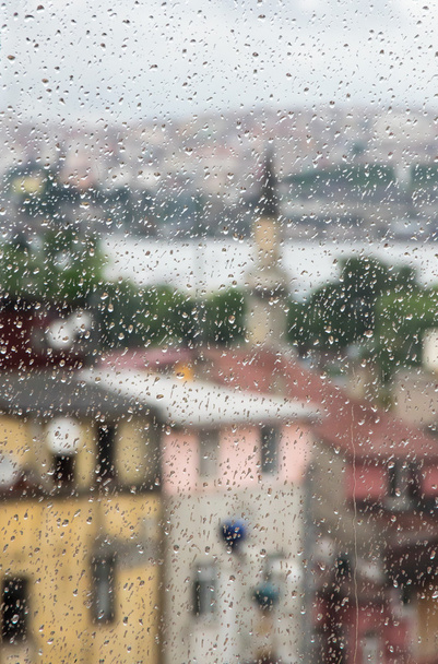 Rainy Istanbul through the window - 写真・画像
