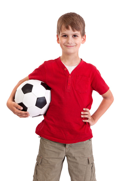 Cute boy is holding a football ball. Soccer ball - 写真・画像