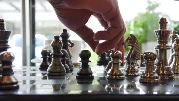 concept of Man playing silver chess - Footage, Video