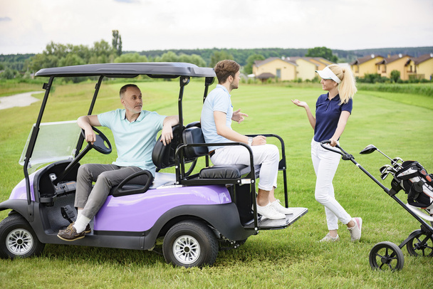 Golfing companions on golf course - Foto, Imagen