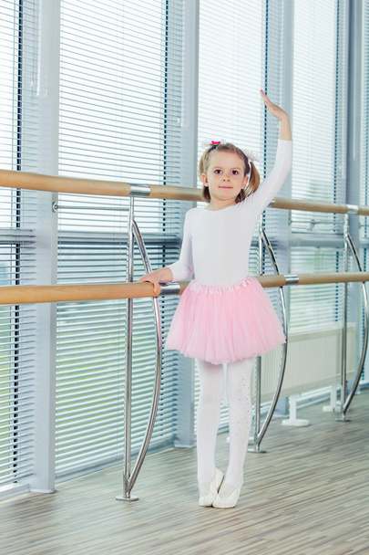 The young girl dances in a ballet tutu in the hall - Foto, Imagem