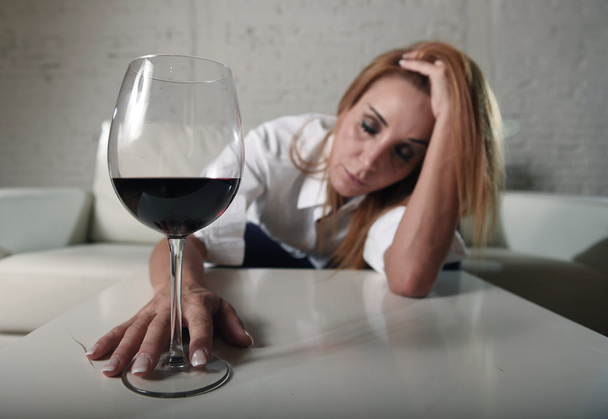 sad depressed alcoholic drunk woman drinking at home in housewife alcohol abuse and alcoholism - Foto, Bild