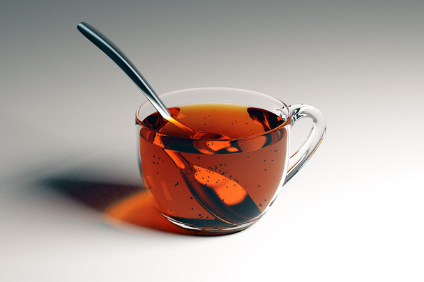 Чашка чая с ложкой - Фото, изображение