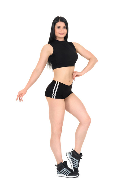 Moda fitness, joven mujer deportiva sexy. Aislado sobre blanco
. - Foto, Imagen