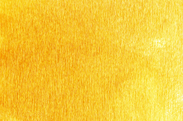 Shiny yellow gold foil texture for background. and shadow - Photo, Image
