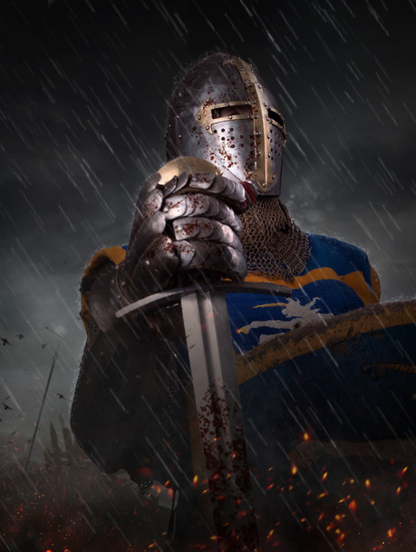A knight with sword under the rain - Photo, Image