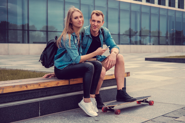 Casual couple with longboard  - Fotoğraf, Görsel