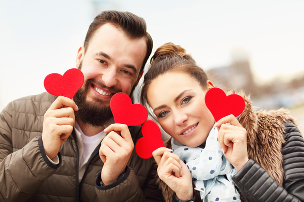 Romantic couple holding hearts - Photo, Image