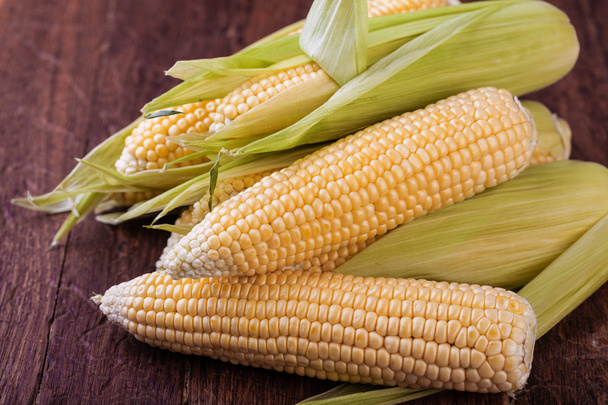 corn isolated on a wooden - Photo, Image