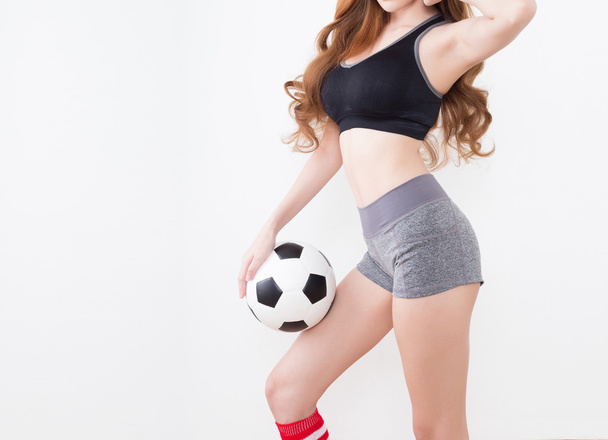 Sexy woman body with soccer ball - Foto, imagen