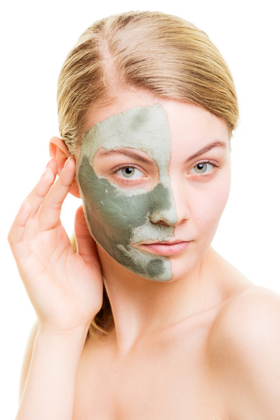 Woman in clay mud mask - Foto, immagini
