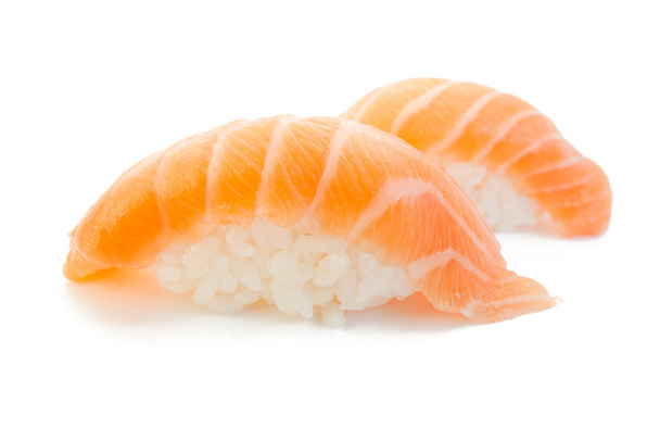 Closeup of delicious japanese salmon sushi isolated on white - Fotoğraf, Görsel